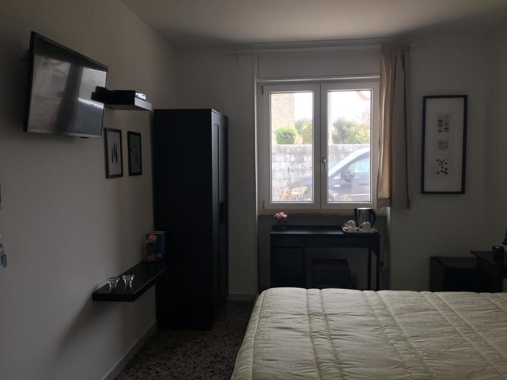 Postel nebo postele na pokoji v ubytování B&B ViaDelMare