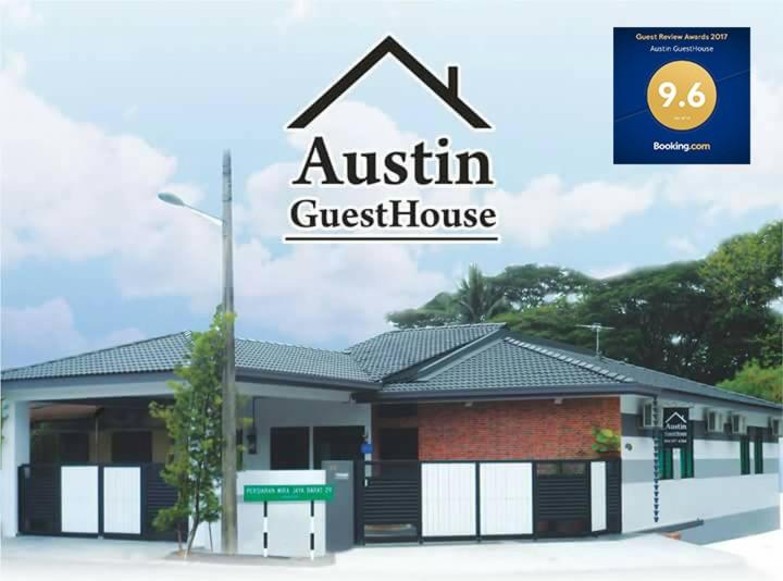 a sign for a austin guest house at Austin GuestHouse in Ipoh