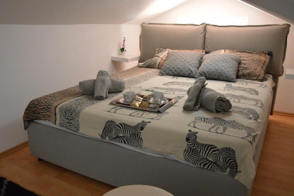 Postel nebo postele na pokoji v ubytování Apartment Prima