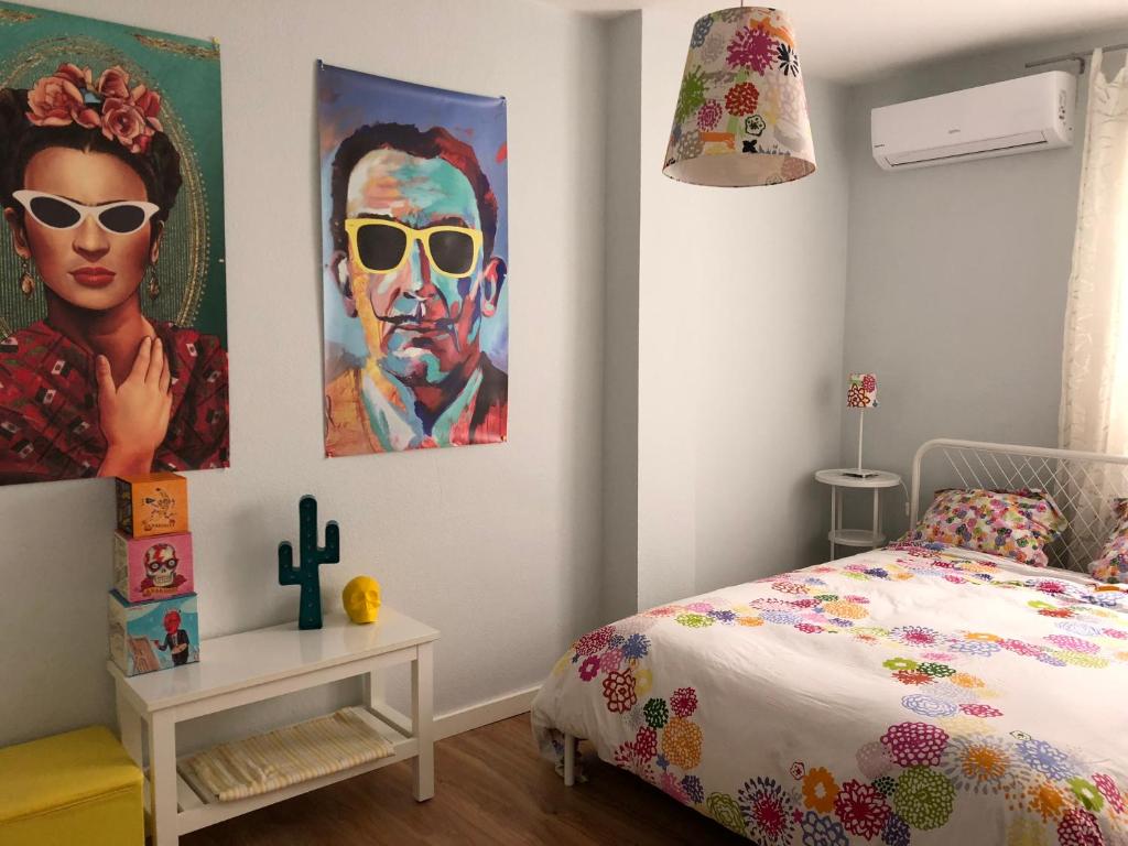 A bed or beds in a room at Casa De Los Espejos