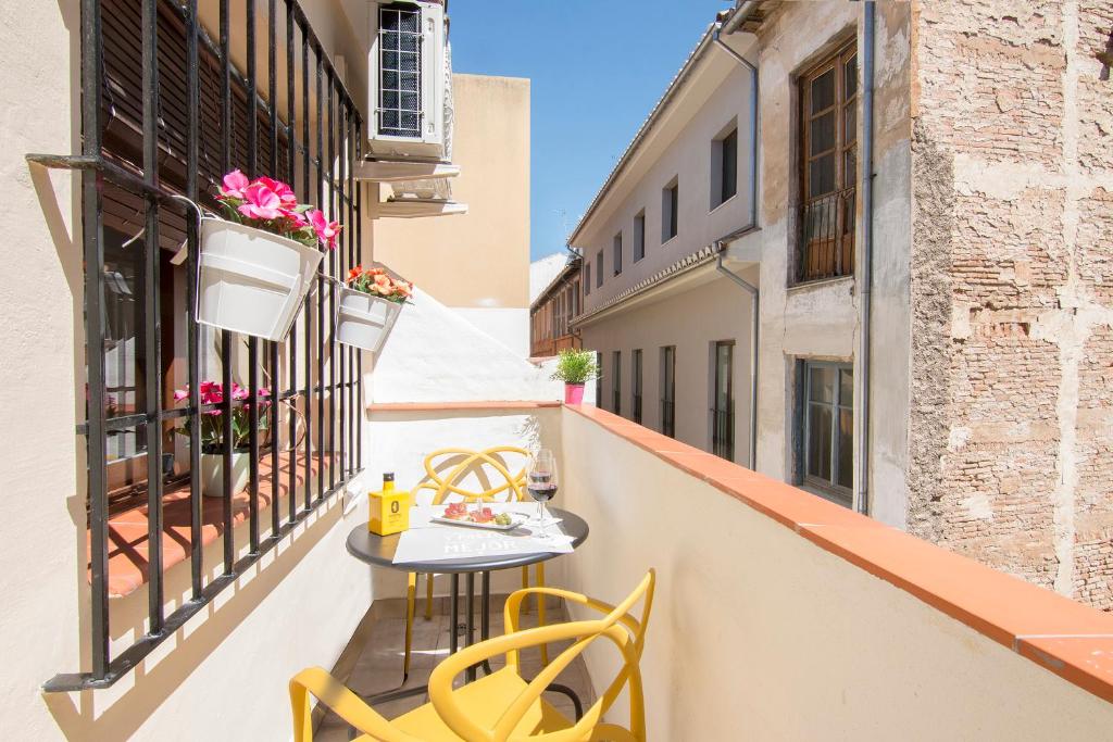 A balcony or terrace at terrazas de la catedral atico wifi