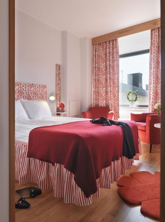 Postel nebo postele na pokoji v ubytování Home Hotel Wellington