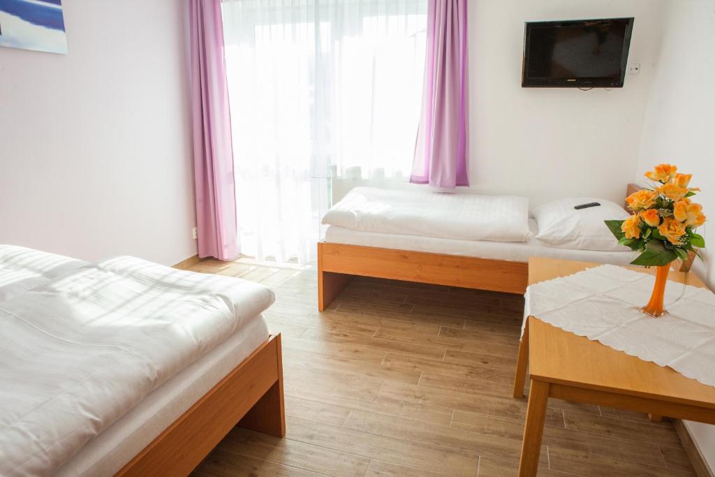 Postel nebo postele na pokoji v ubytování Vila Sofia