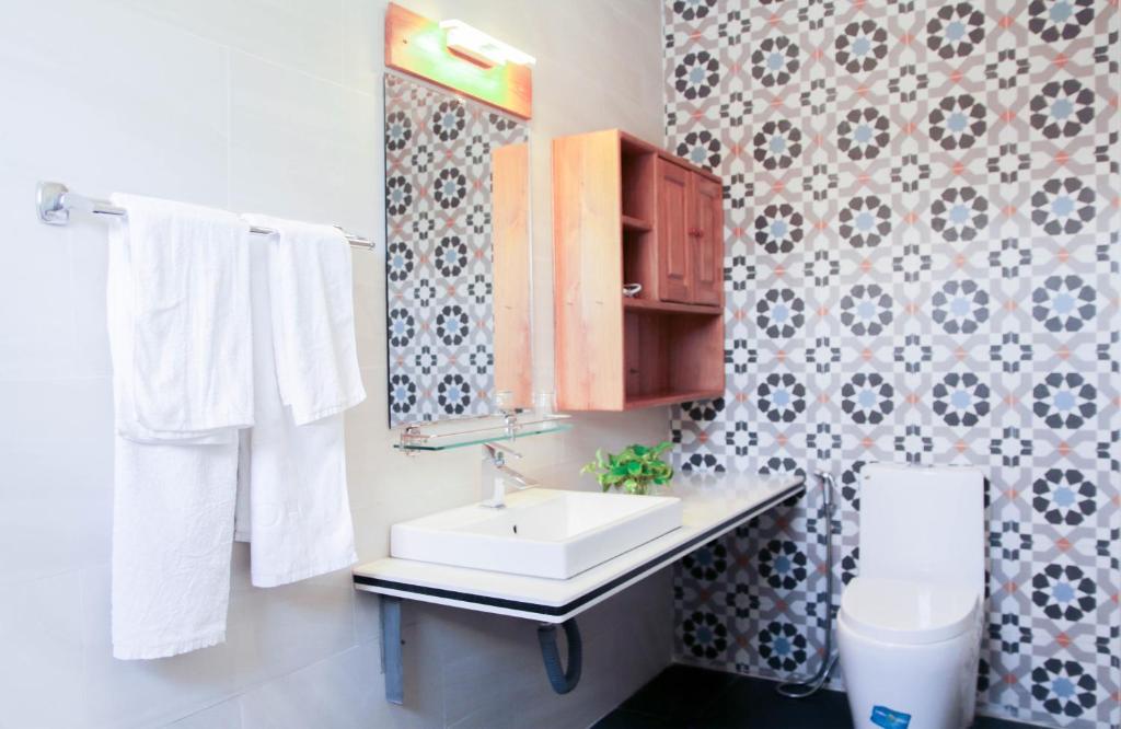 Koupelna v ubytování Cavilla Boutique Hotel & Apartment Da Nang