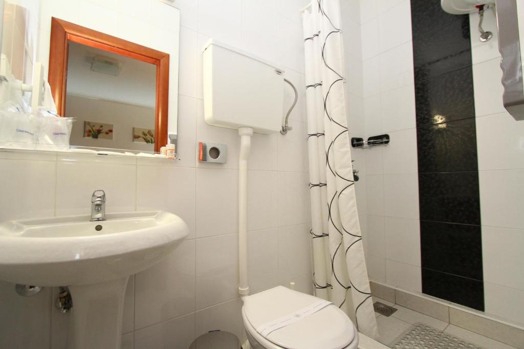 Koupelna v ubytování Guesthouse Villa Inn