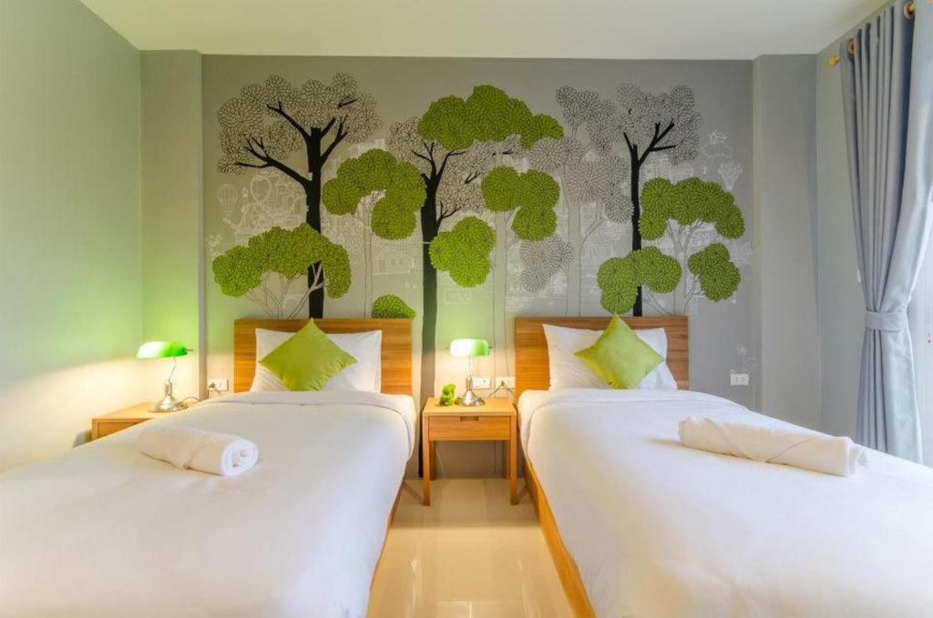 Postel nebo postele na pokoji v ubytování Ao Nang Miti Resort