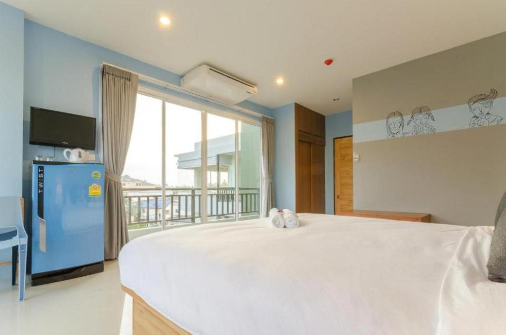Postel nebo postele na pokoji v ubytování Ao Nang Miti Resort