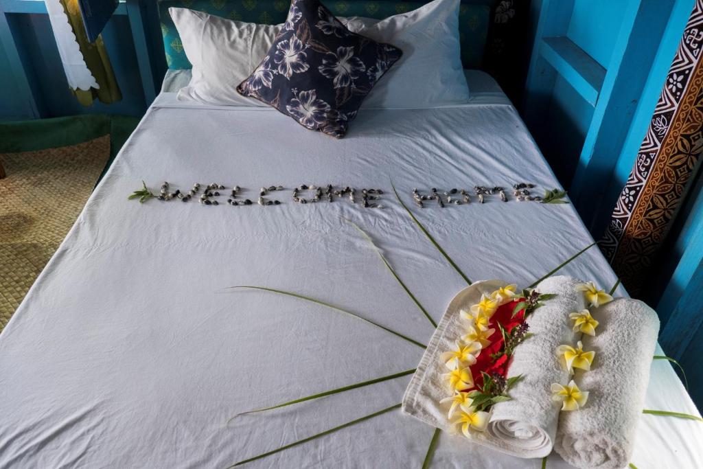 Letto o letti in una camera di Yasawa Homestays