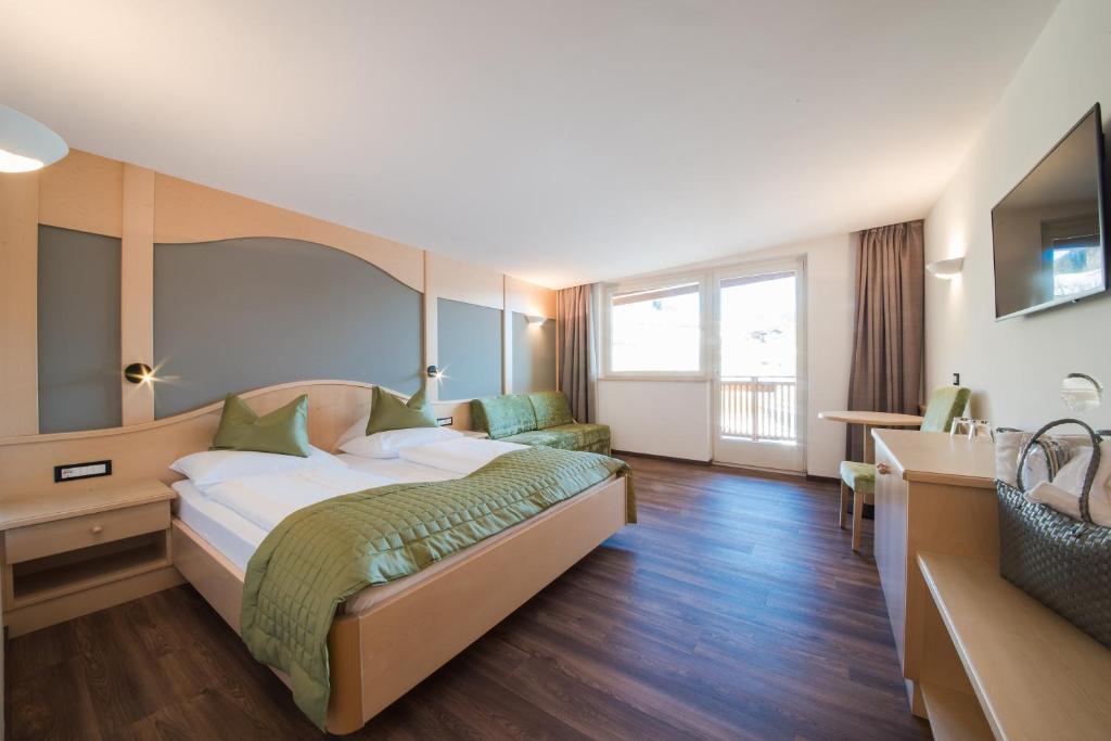 Postel nebo postele na pokoji v ubytování Hotel Salten