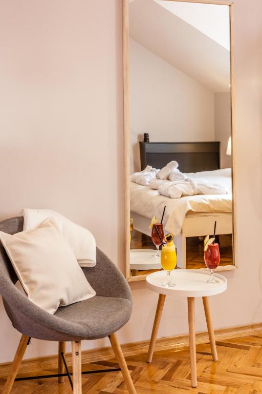 Postel nebo postele na pokoji v ubytování Apartmani studio