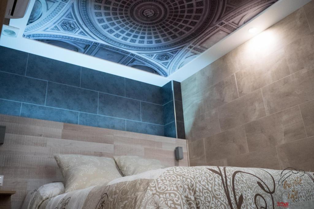 Postel nebo postele na pokoji v ubytování Apartamento Quixote Loft Almagro