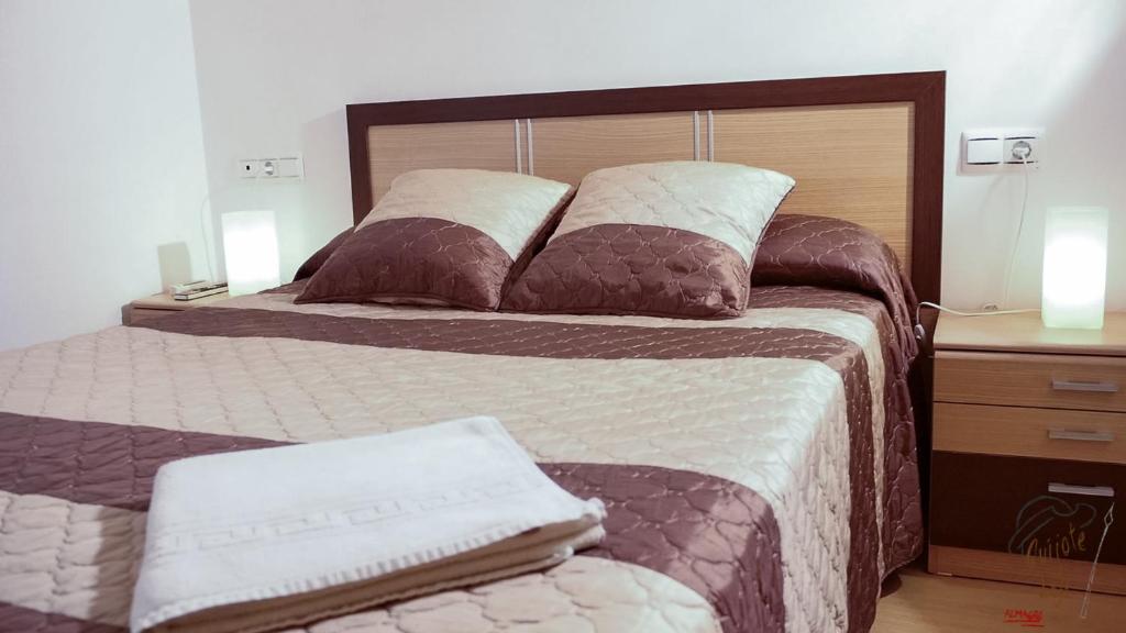 Postel nebo postele na pokoji v ubytování Apartamento Quixote Loft Almagro