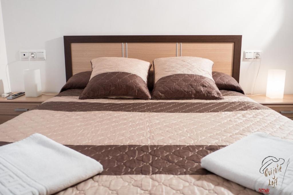 Postel nebo postele na pokoji v ubytování Apartamento Quixote Loft Almagro
