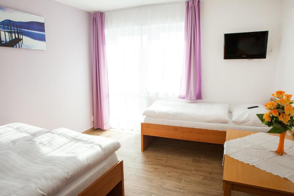 Postel nebo postele na pokoji v ubytování Vila Sofia