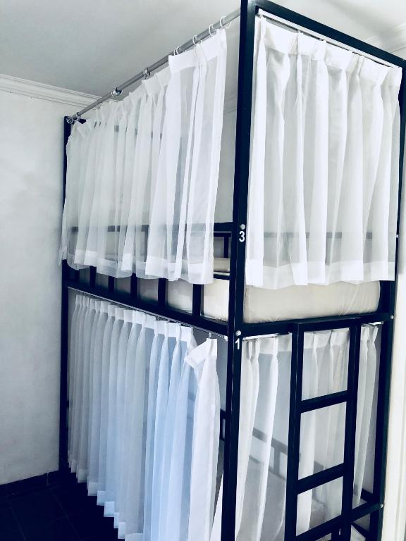 Postel nebo postele na pokoji v ubytování Inn Between