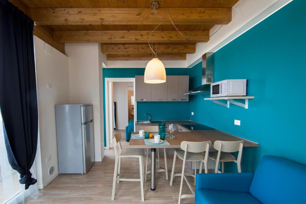 Kuchyň nebo kuchyňský kout v ubytování Camping Bergamini