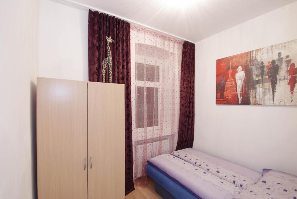 Postel nebo postele na pokoji v ubytování Raisa Apartments Fünkhgasse