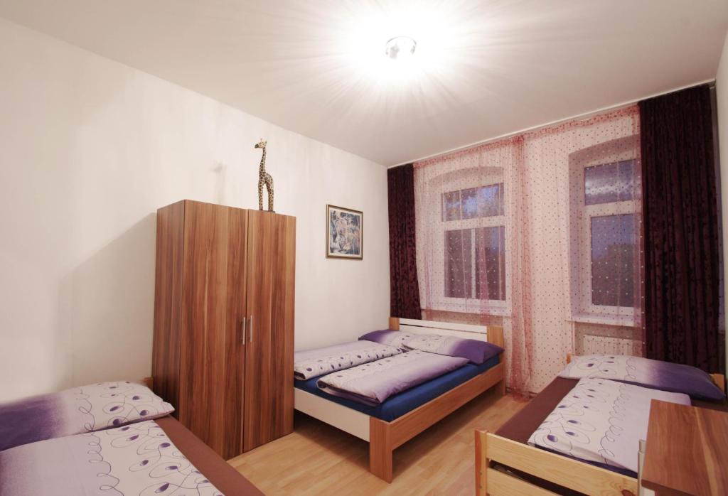 Postel nebo postele na pokoji v ubytování Raisa Apartments Fünkhgasse