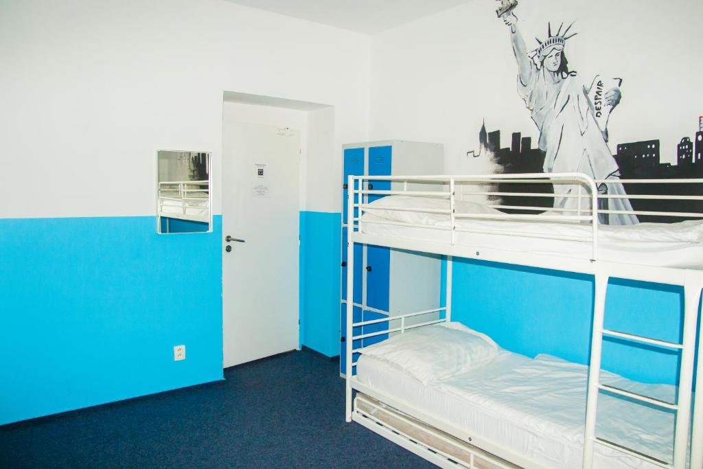 Una cama o camas en una habitación de Hostel Franz Kafka