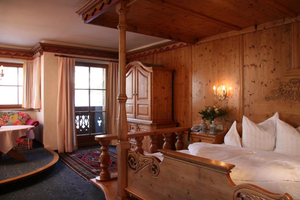 Postel nebo postele na pokoji v ubytování Das Traditionshotel Schwarzer Adler