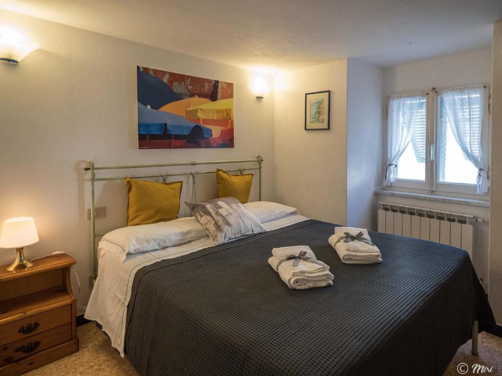 Postel nebo postele na pokoji v ubytování Mainetta Sea View Apartment with AC