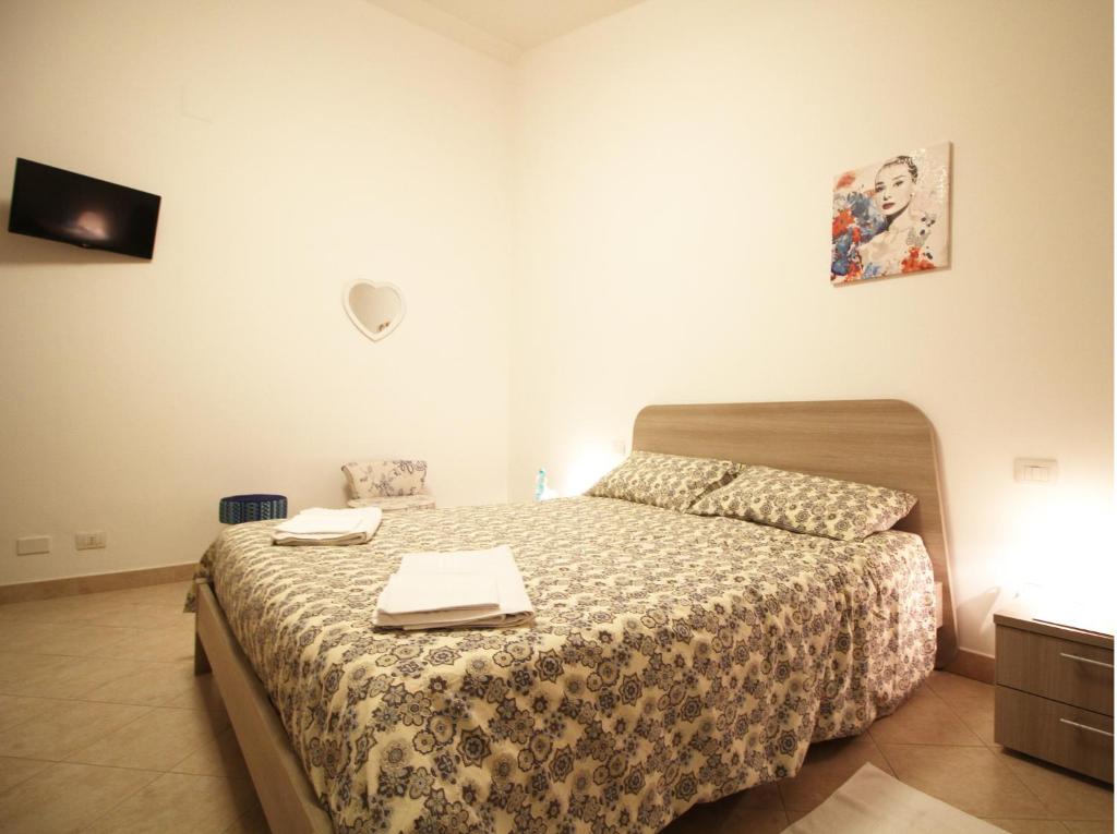 Postel nebo postele na pokoji v ubytování Aquí