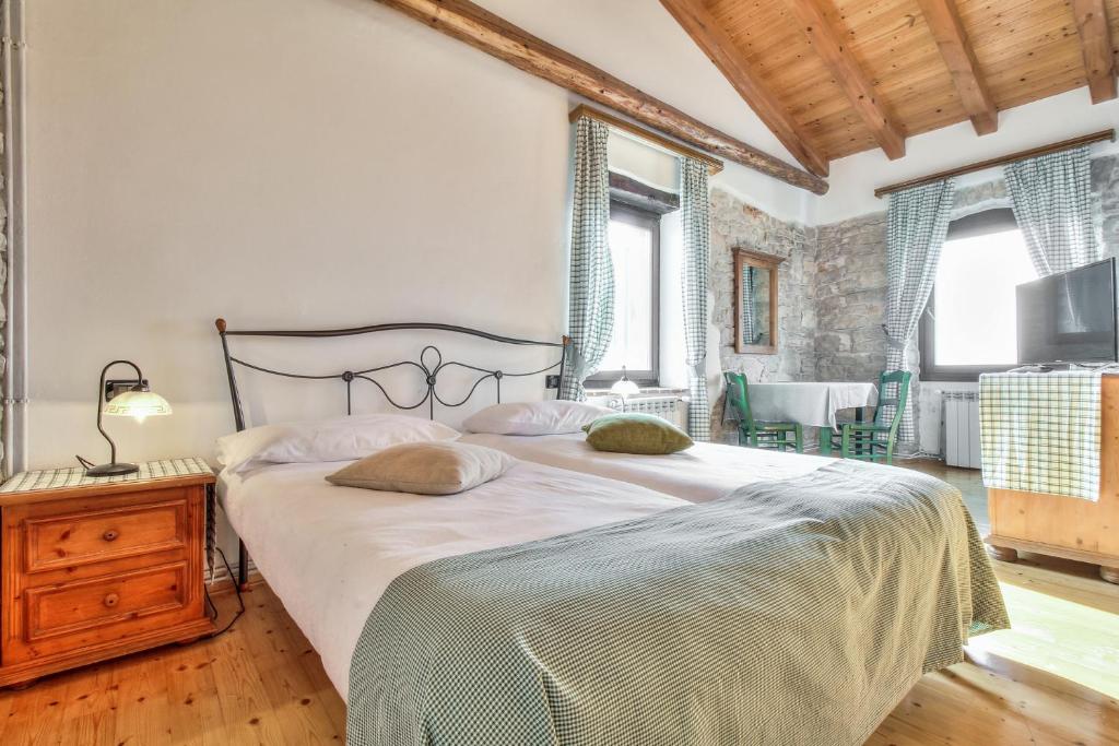 Posteľ alebo postele v izbe v ubytovaní Casa Romantica La Parenzana