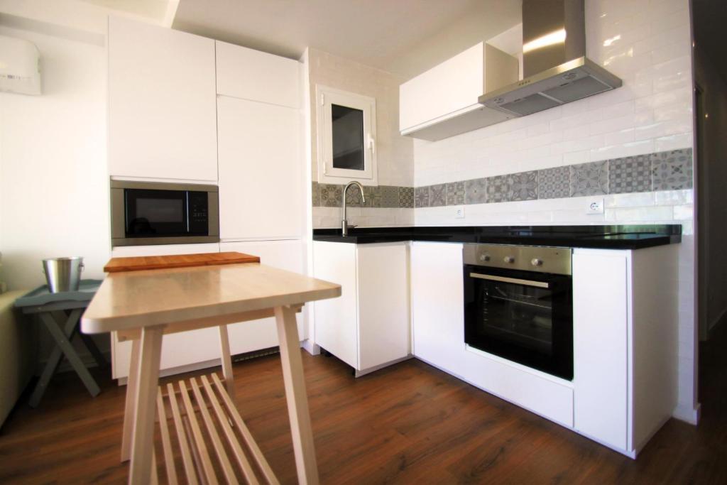 Kuchyň nebo kuchyňský kout v ubytování City Sea Views Apartment Alicante