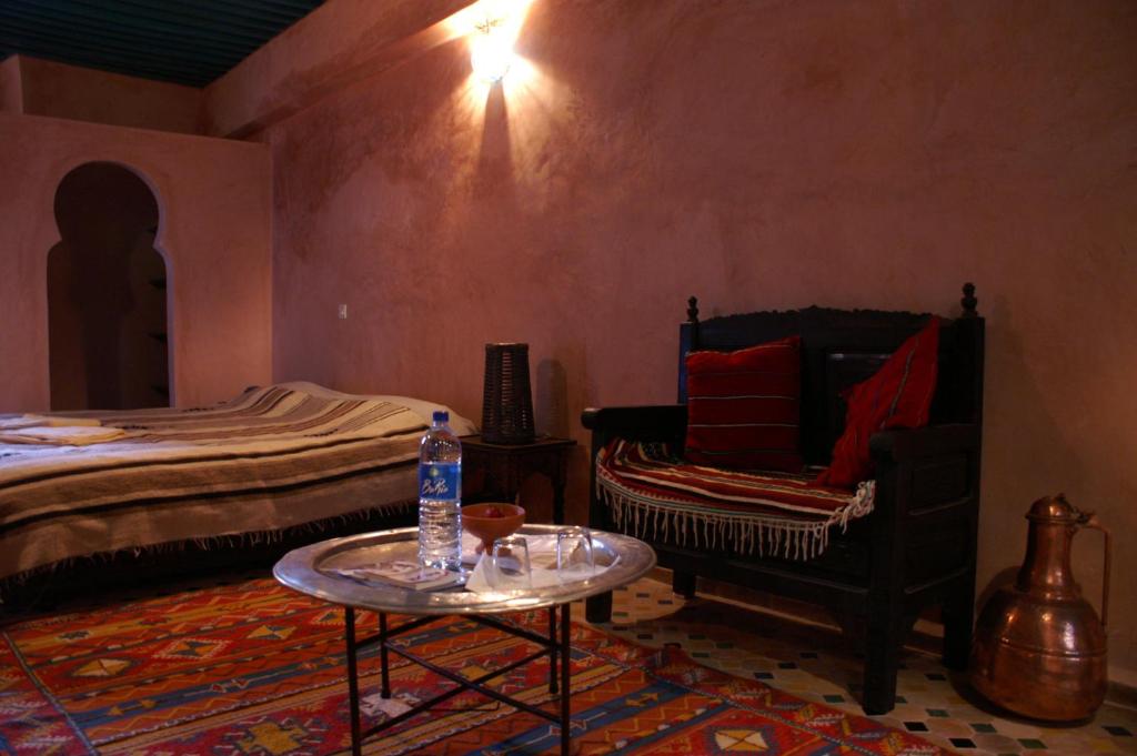 Postel nebo postele na pokoji v ubytování Riad Felloussia