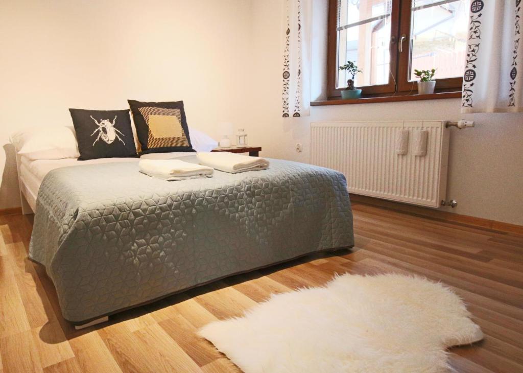 Posteľ alebo postele v izbe v ubytovaní Apartament BazaTatry Świstak