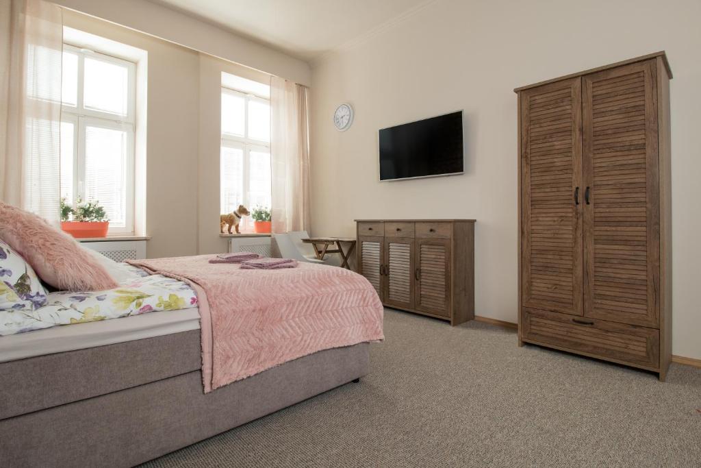 Postel nebo postele na pokoji v ubytování Delis Apartments - Dluga Street 11/3