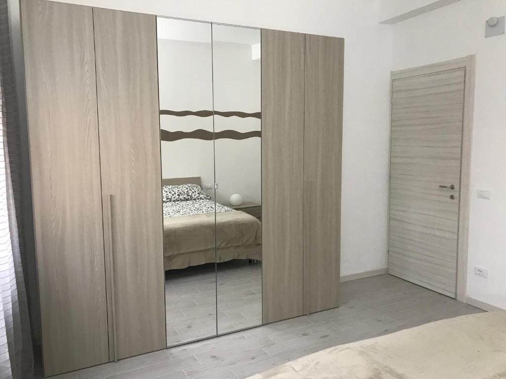 Posteľ alebo postele v izbe v ubytovaní Appartamenti Giada