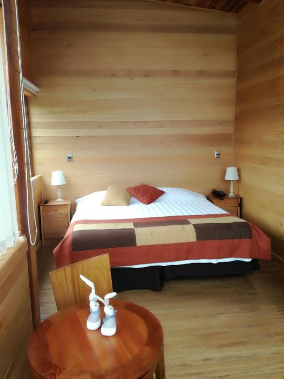 Postel nebo postele na pokoji v ubytování Puerto Chico Hotel