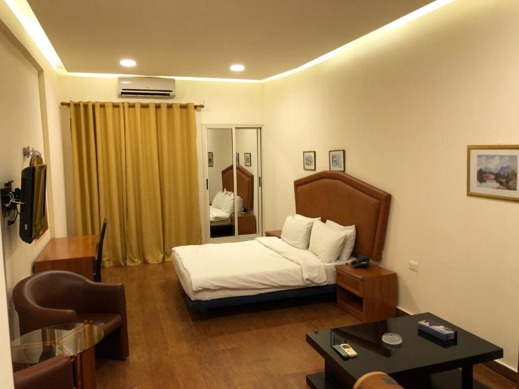Postel nebo postele na pokoji v ubytování Dreams Suites