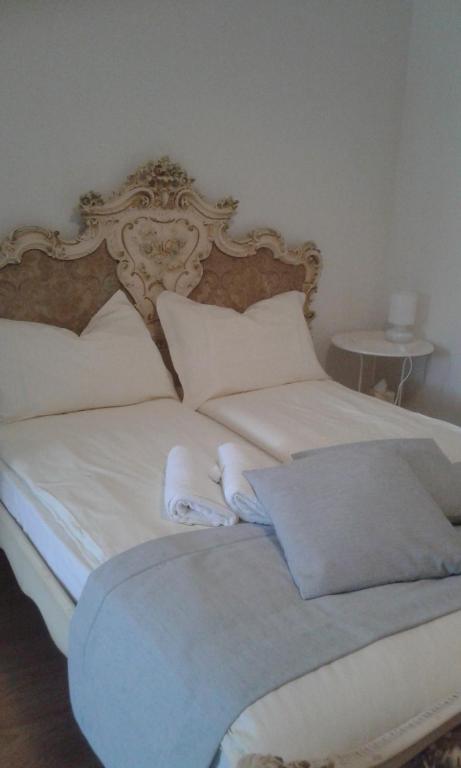 A bed or beds in a room at Il Borgo dei Molini