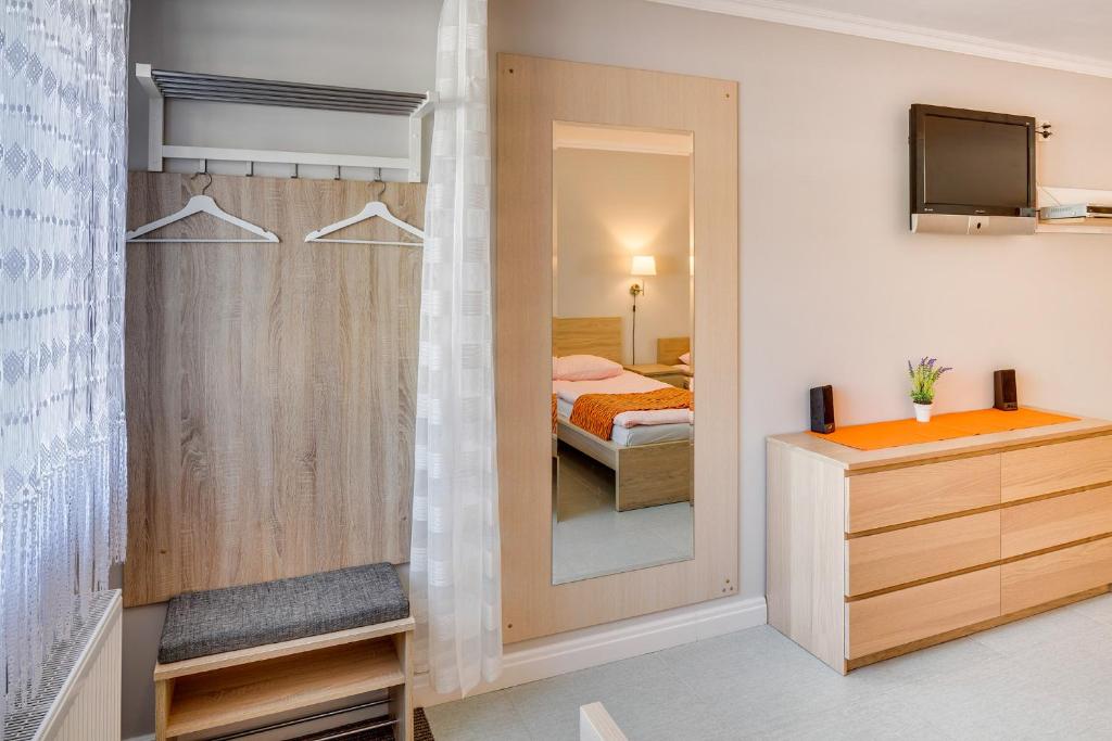 Postel nebo postele na pokoji v ubytování Apartements Studio 964