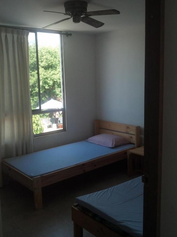Postel nebo postele na pokoji v ubytování La Loma