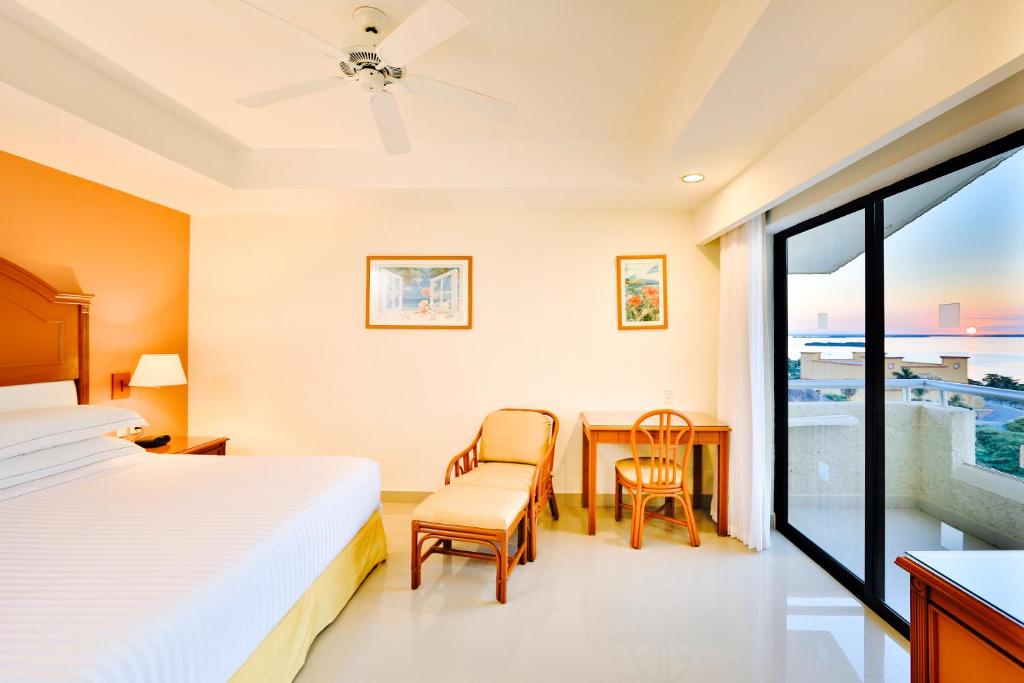 Postel nebo postele na pokoji v ubytování Occidental Tucancún - All Inclusive