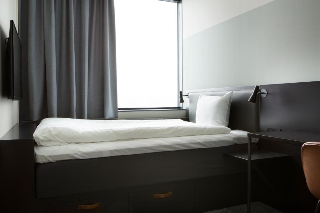 Postel nebo postele na pokoji v ubytování Comfort Hotel Västerås