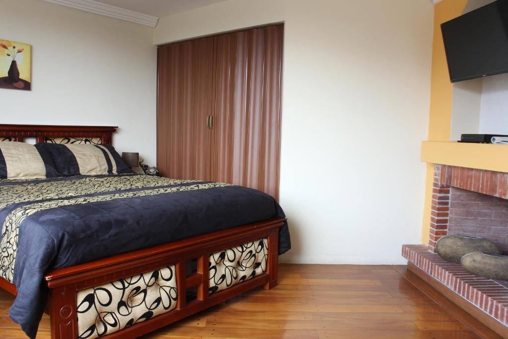Postel nebo postele na pokoji v ubytování Altura Rooms & Suites