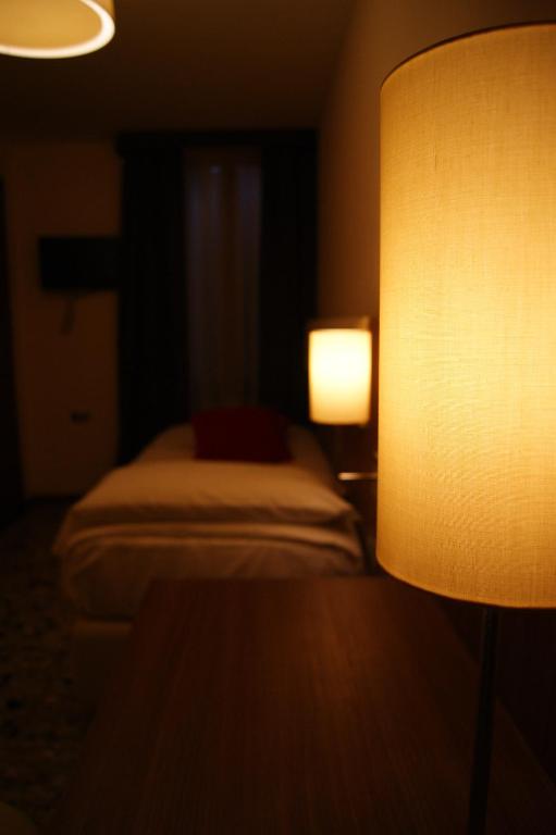 Posteľ alebo postele v izbe v ubytovaní Hotel Il Moro di Venezia