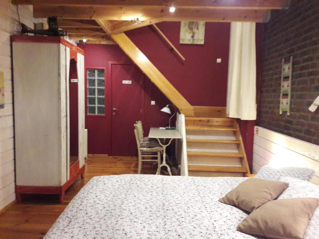 Кровать или кровати в номере B&B Le Bonimenteur