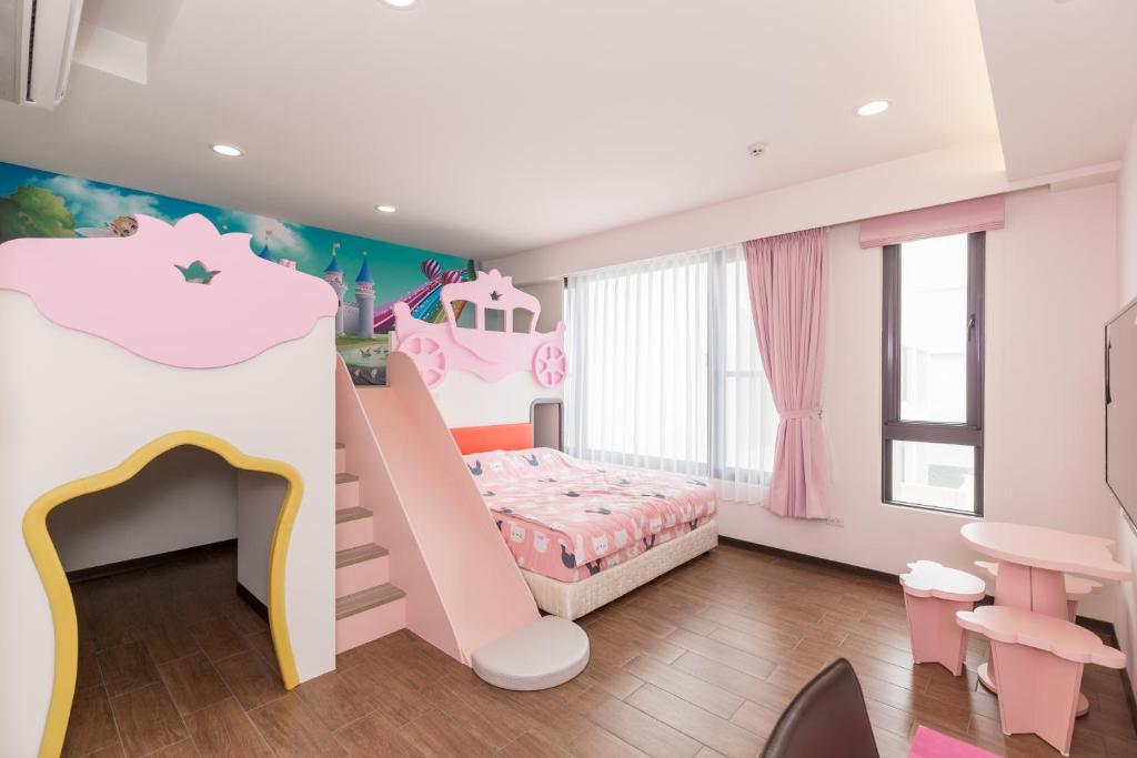 Postel nebo postele na pokoji v ubytování Love Peachy House