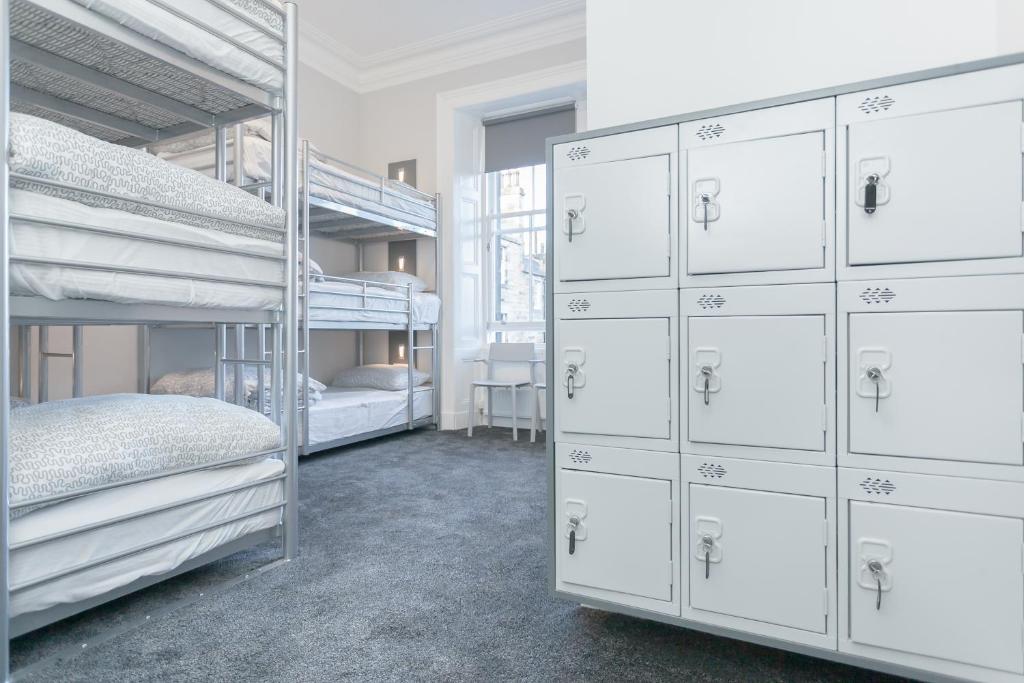 Postel nebo postele na pokoji v ubytování West End Hotel