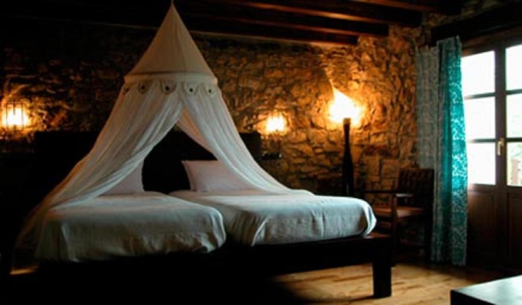 Postel nebo postele na pokoji v ubytování Kuko Hotel - Adults Only