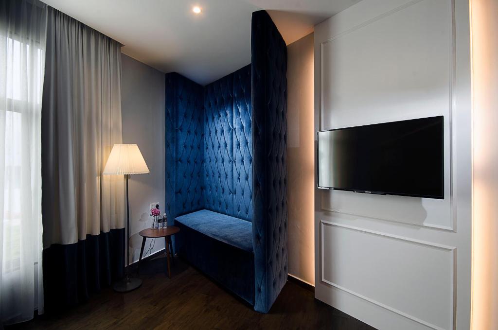 TV a/nebo společenská místnost v ubytování Palm Hotel Ipoh