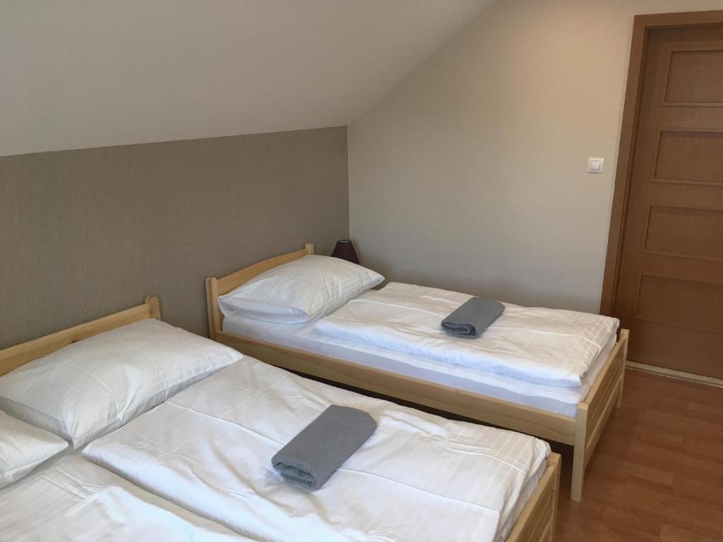 Postel nebo postele na pokoji v ubytování Chata Hluchavka II