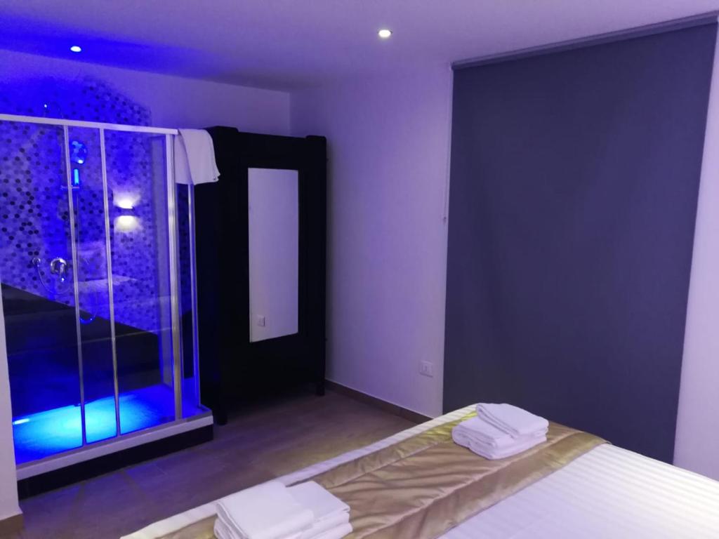 Postel nebo postele na pokoji v ubytování Hotel Assisivm Antica Dimora AD