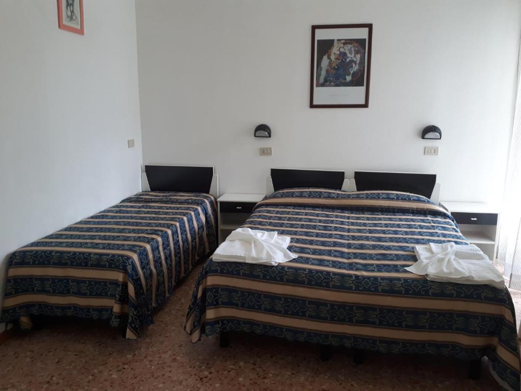 Postel nebo postele na pokoji v ubytování Hotel Bahamas