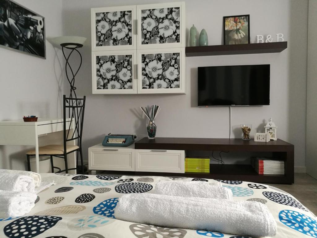 A bed or beds in a room at B&B A casa dell'artista
